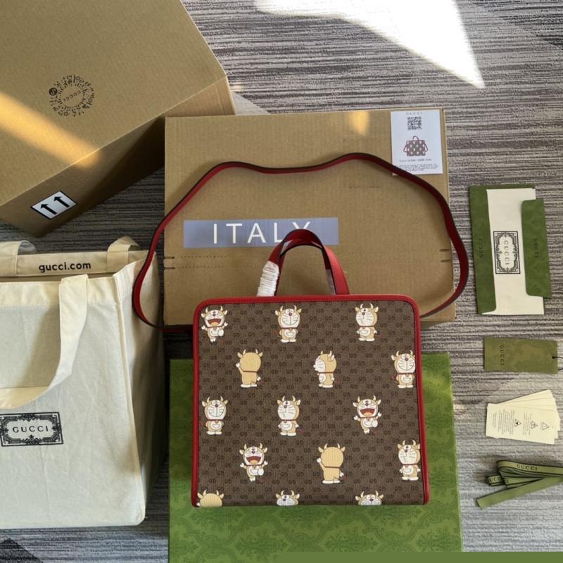 G*u*i shopping bags